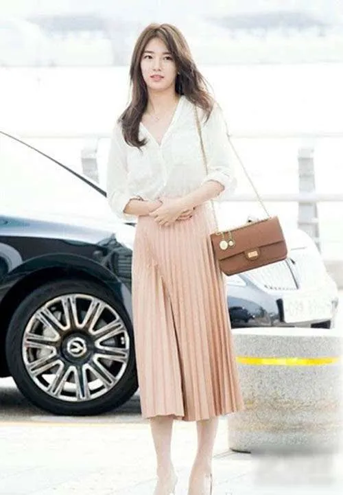 cach-phoi-do-cho-nguoi-chan-to-chan-vay-xep-ly-dai cách phối đồ cho người chân to chân váy xếp ly dài