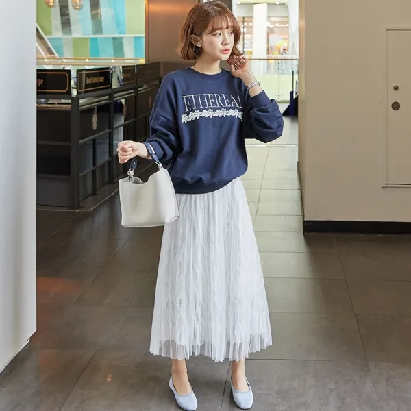chan20vay20xoe20ket20hop20ao20sweater-1 mix đồ với chân váy xòe mùa đông và áo sweater