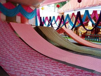 quy trình dệt vải gấm là gì