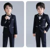 Bộ Vest bé trai xanh đậm trơn viền trắng